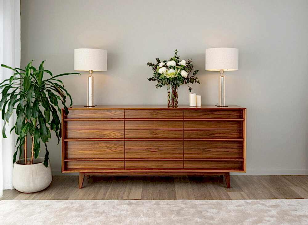 South Australian Made Dan Bedside Table Solid Timber Walnut with 9 drawers and in a home setting.