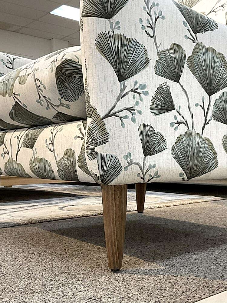 Molmic, Melbourne made fully pattern upholstered occasional chair with timber legs. View of legs