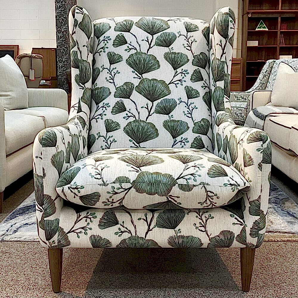 Molmic, Melbourne made fully pattern upholstered occasional chair with timber legs. View of front