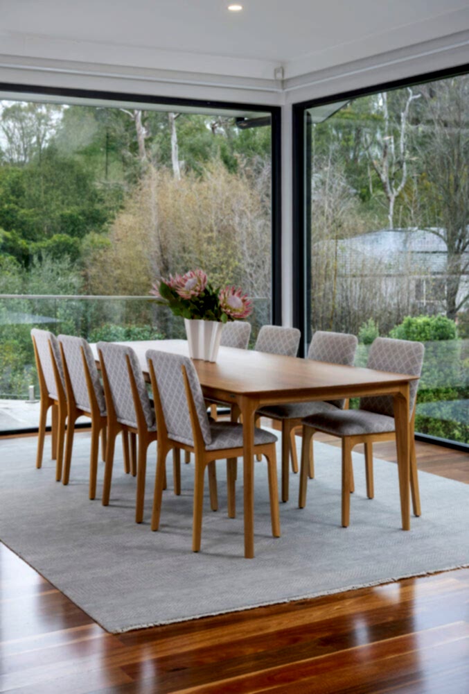 Adelaide, South Australian made solid American Oak timber dining table and upholstered chairs.