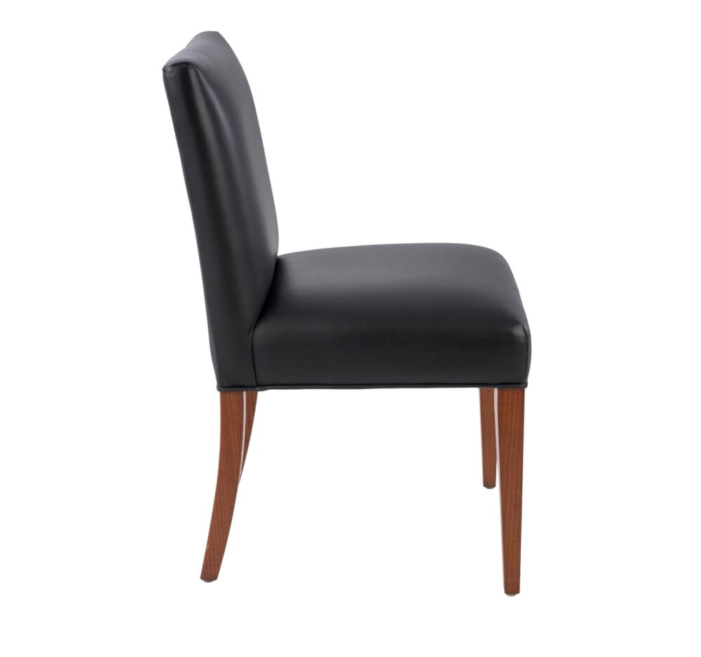 Adelaide, South Australian made solid timber Leone Low Back premium dining chair upholstered in black leather, view of side.