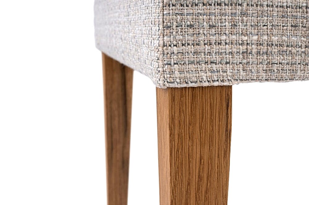 Adelaide, South Australian made solid timber Henley dining chair upholstered in fabric, view of leg detail.