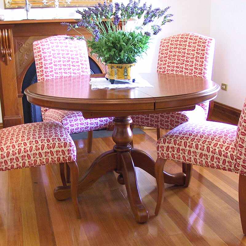 Macquarie round pedestal dining table in mahogony with chairs